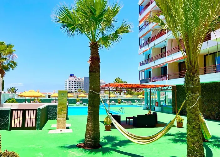 Miss Flora Olympia * פלאייה דה לאס אמריקס